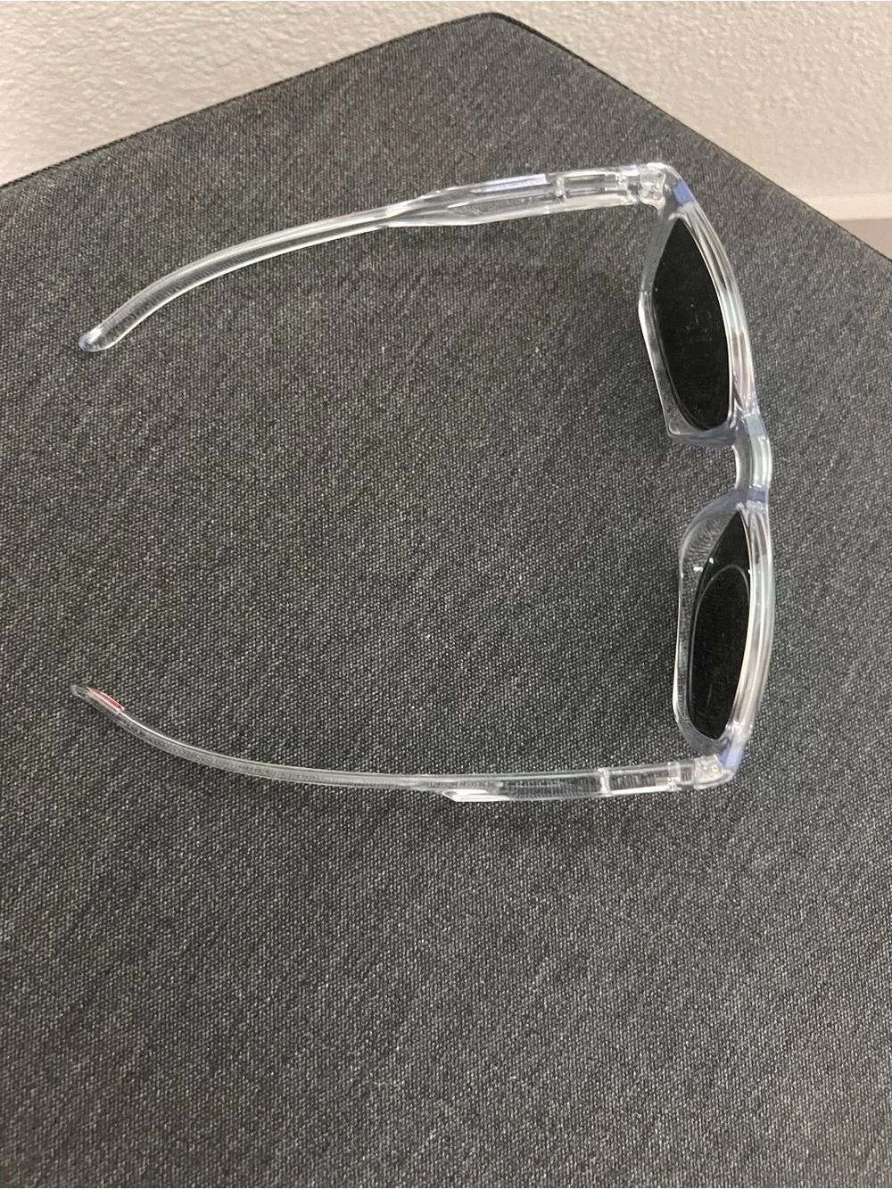 Oakley Clear Frame Sunglasses with Bright Blue Mirrored Lenses